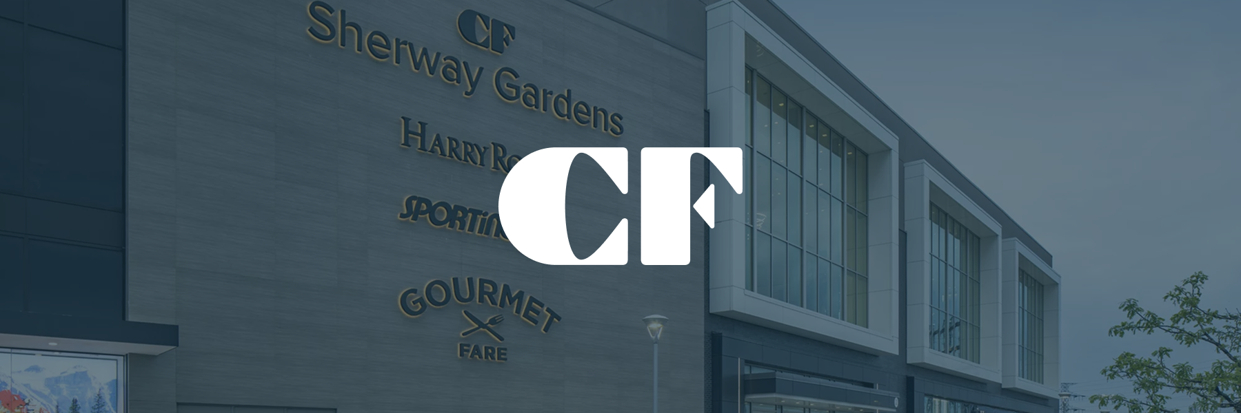 CF Sherway Gardens seen from the street, with the Cadillac Fairview mark over it